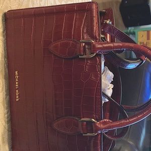 Michael Kors bag color red.Excellent condition